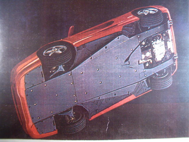Enzo Ferrari smoothes the underside of his famous sportscars.What gives more speed can also give better fuel economy
