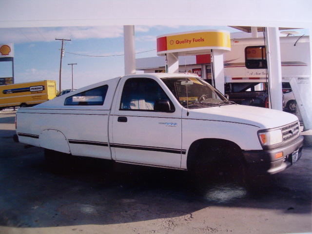 T-100 feeds in Oddessa,Texas. Passenger-side view reveals side window for safe outward vision