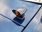 A headlight detecting sensor on the front driverside hood of a late 60's Lincoln Continental. It detects oncoming headlights and switches the...