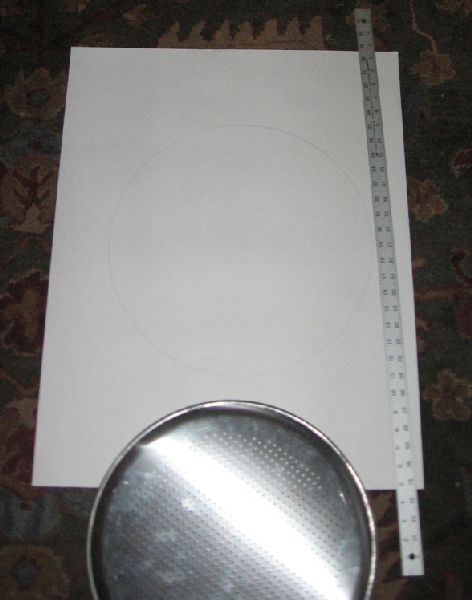 I took some poster paper and used a 16" pizza-pan to draw a circle.