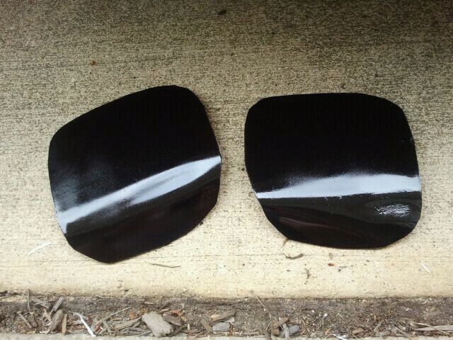 Painted Fog Light Covers. You can see on the right cover where the heat gun got a little to friendly with the plastic. 
:-)
