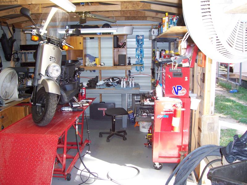 My '07 Yamaha C3 Scooter getting some TLC in the old shop...