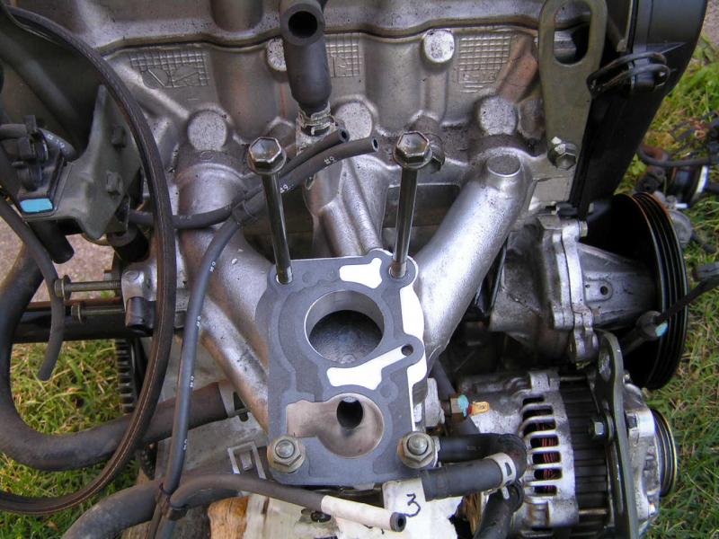 '94 Intake. Look how clean it is with 60 original miles...to bad I couldn't use it. Anybody interested in buying it off me? I have the throttle body that was mated to it as well...