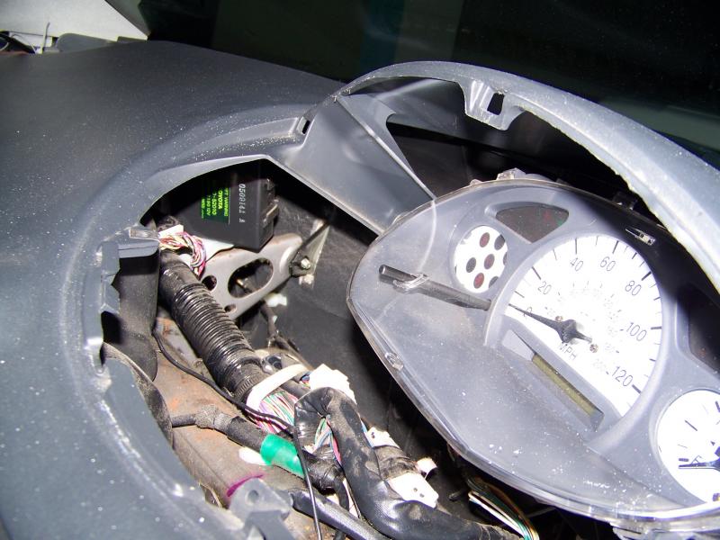 This is the view of the instrument cluster with out the trim cover. There is plenty of space to add other components.