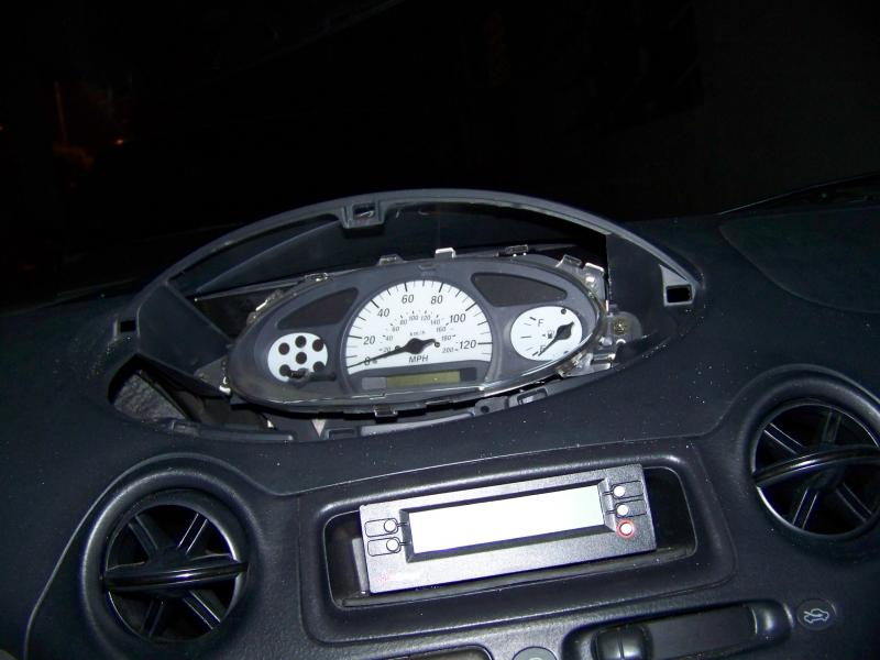 This is the view of the instrument cluster with out the trim cover. There is plenty of space to add other components. You can also see the Scan Guage II with fits perfectly on that empty compartment.