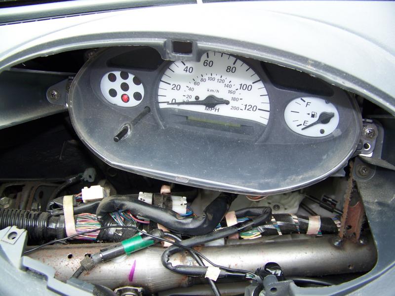 This is the view of the instrument cluster with out the trim cover. There is plenty of space to add other components.