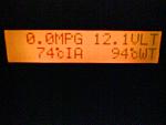 The Scan Gauge II displaying miles per gallon (MPG), volts (VLT), intake air temperature (cIA) and coolant temperature (cWT). Both temp readings are...