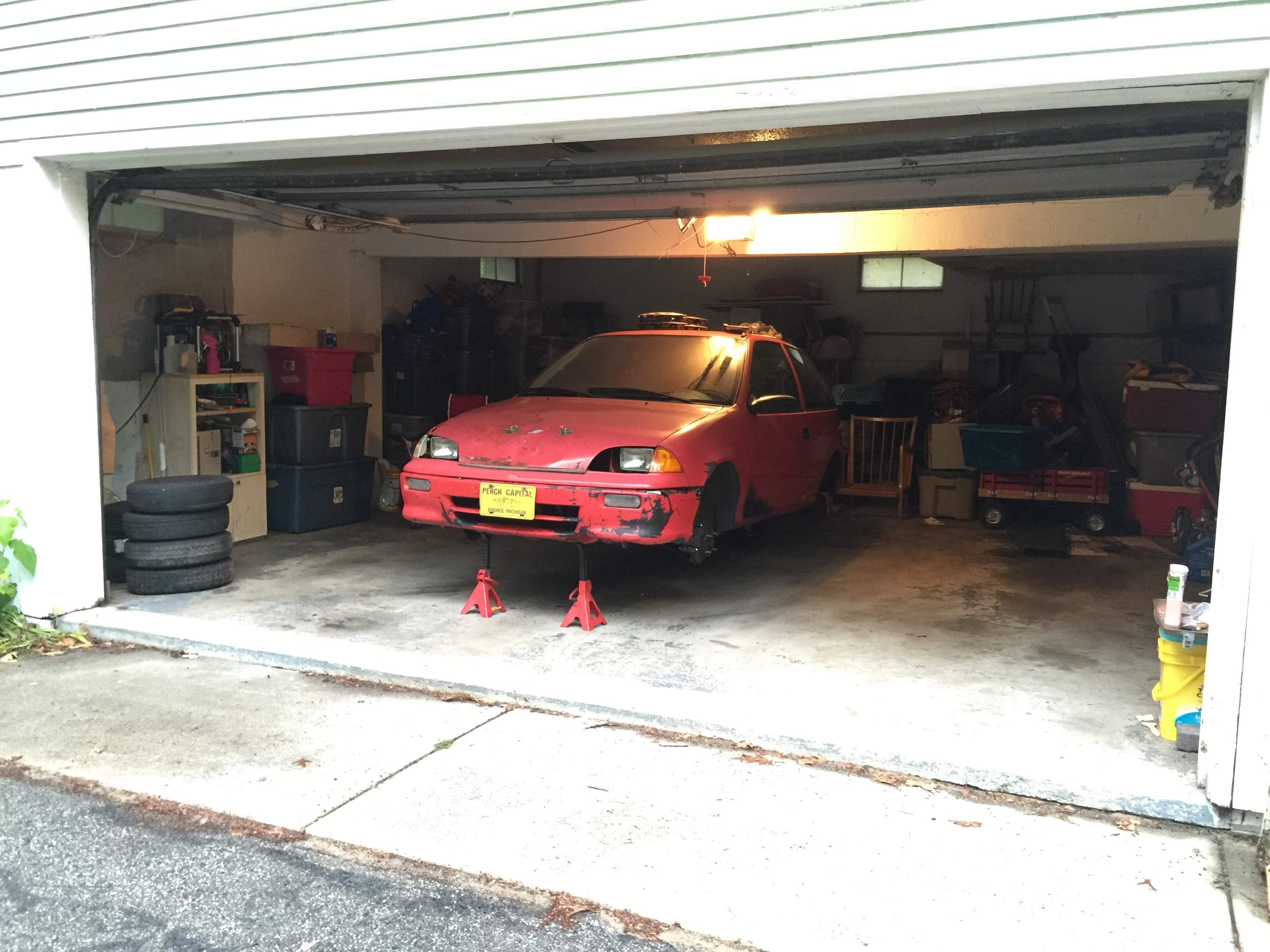 Putting four new tires on the Metro a few years back.