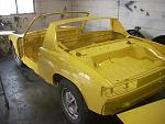 Here is the car after bodywork and paint. The color here is Highway Yellow.