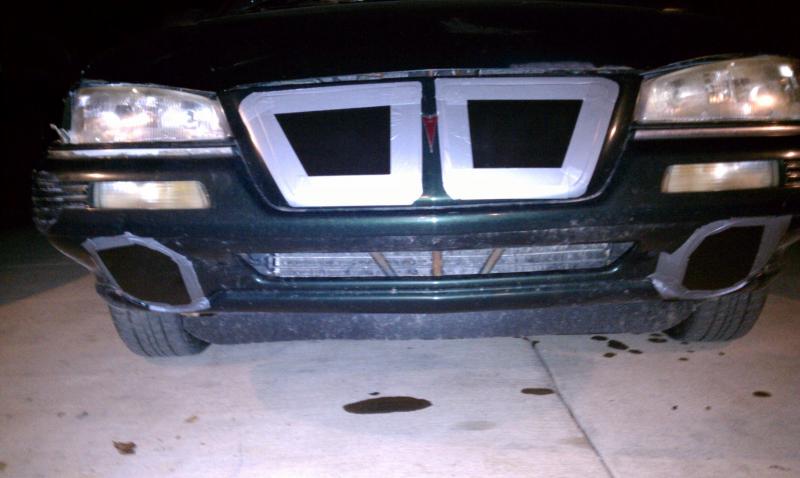 Removed the remaining fog light and covered up both the holes.