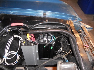 The Kelly Controller and DC/DC converter are mounted up near the front of car.  I ran the DC lines from the trunk towards the front of car to avoid electrical interference from the 3-phase BLDC lines.