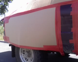 wheel skirt proto 1

Note clearance at front corner of tire is about .5", but no rubbing has been noticed.  I had to wad up a cardboard shim for the fender flare to get the clearance right.  I think this is the right shape for trucks.  Sort of inspired by motorsport blister fenders.