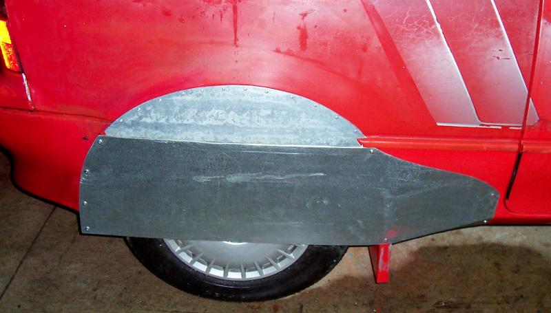 Rear wheel skirts unpainted side view