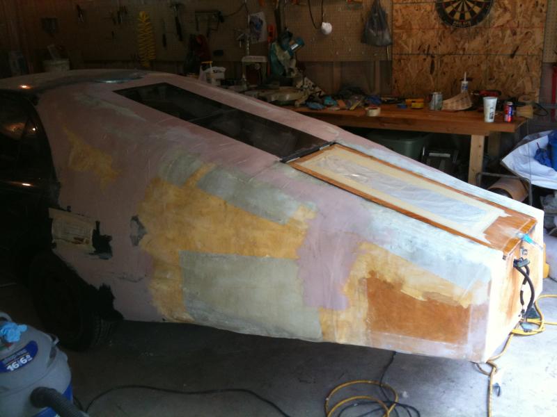 Starting the intial bonding to smooth out between the body and fiberglass/styrofoam body.