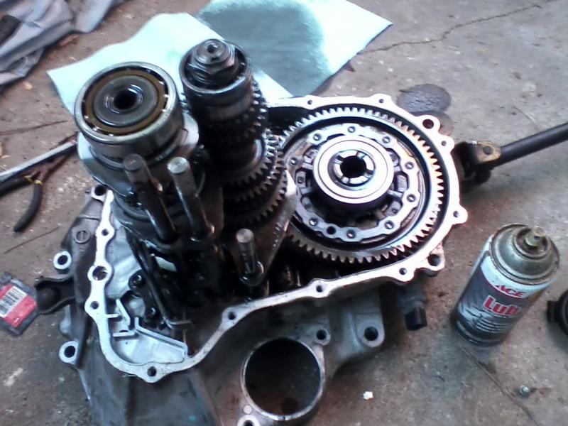 HX Trans case off inspecting gears synchros and bearings